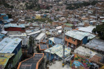 The 384-metre-long escalator in Comuna 13, the most dangerous district in Medellin, Colombia. In 2006, the city built a public library, a new school, public green spaces, and improved access to transportation through a cable car line and escalators connecting the neighbourhoods to the metro and the city. 
