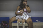 MARCH 15, 2017 -- Miriam and Cleane woke up at 6.30am to get in line early at Association for the Disabled Child (AACD) for Duda's new orthosis, in Recife. Cleane is now 19, and Duda is 13 months. A technician will make moulds of Duda's ankles and feet for new orthosis, a corrective ankle-foot brace. The hospital is a non-profit that provides this care and service for free to families. Duda's previous lung infection has cleared up and her seizures are now under control with medication. She now weighs 16kgs, about 35lbs.