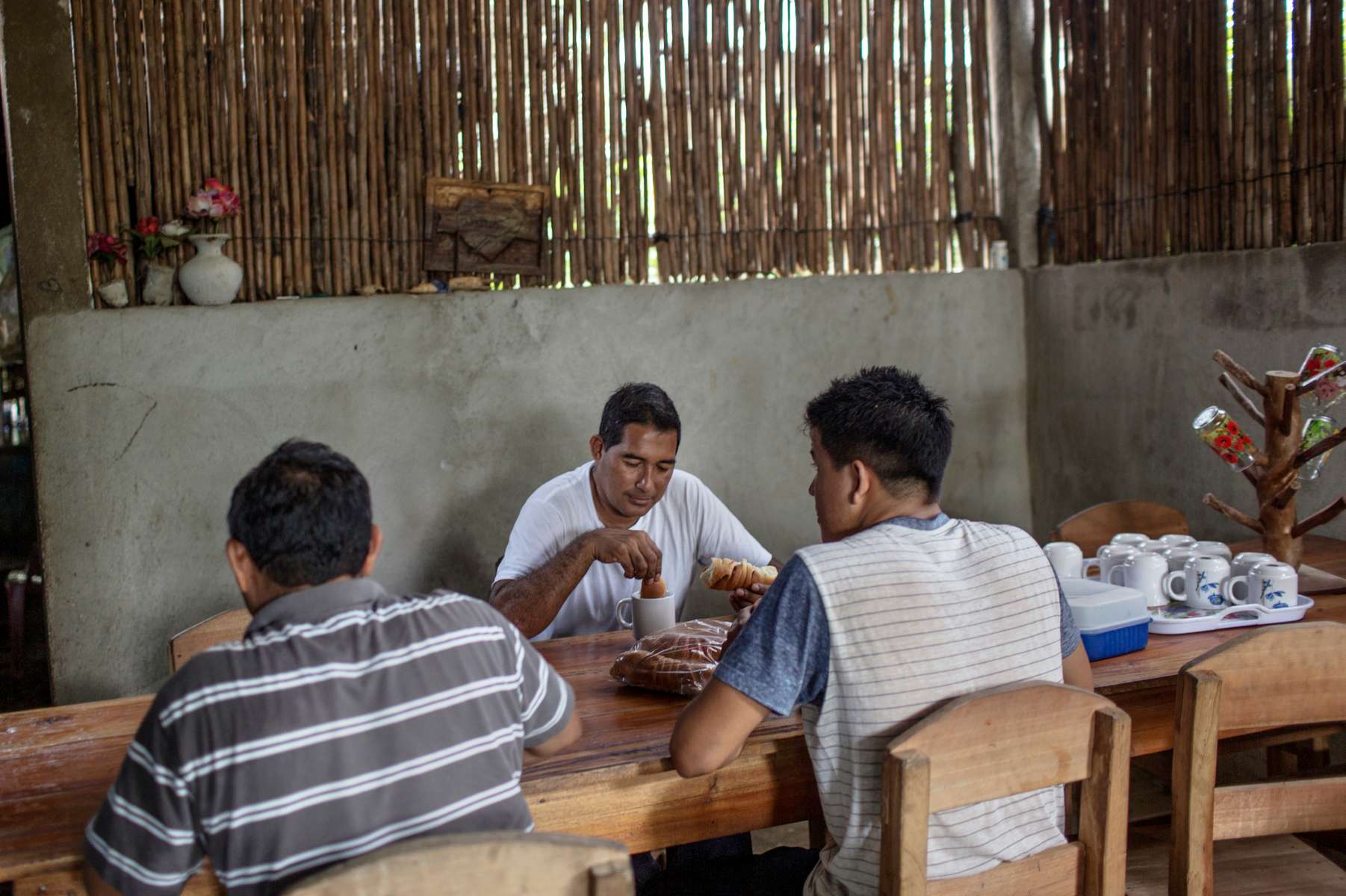 IZABAL, GUATEMALA. February 13, 2018 – Marta Julio's restaurant caters to environmental defenders, NGOs, and palm workers. {quote}My restaurant helps pay for my son's private school tuition.{quote} 