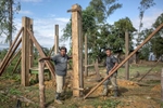 IZABAL, GUATEMALA. February 13, 2018 – Farmers begin construction of a house of an owner who recently acquired the land from a palm oil company in their community, along Lake Izabal, in eastern Guatemala. In the last 20 years, palm oil plantations in the region replaced former cattle ranches and has exacerbated the struggle for land rights in the Polochic Valley. 