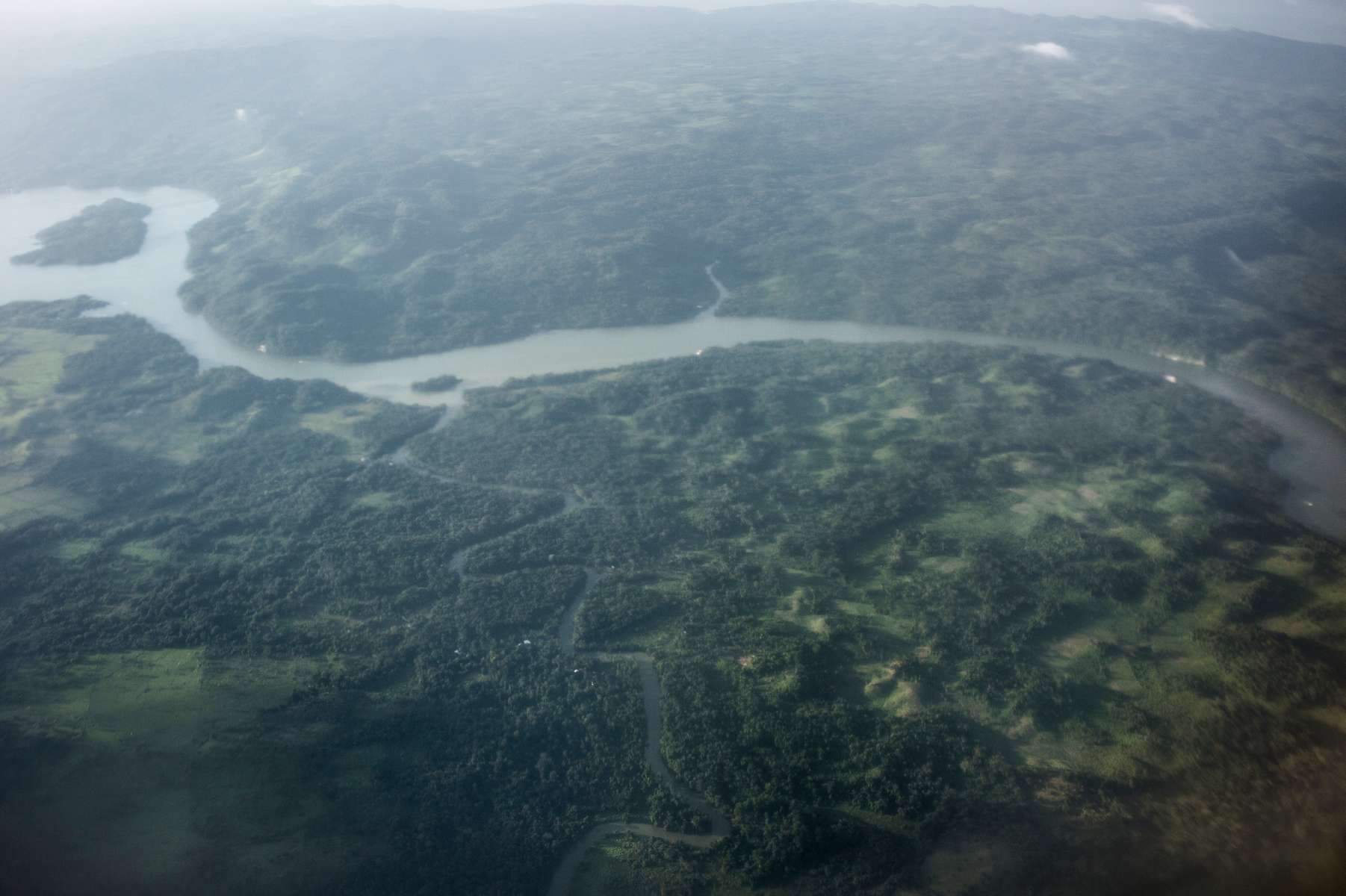 IZABAL, GUATEMALA. February 13, 2018 – The Rio Dulce  connects Lake Izabal to the Carribean Sea, in the Izabal Department, eastern Guatemala.In Guatemala, only four percent of producers control 80 percent of the land. Approximately 60 percent of citizens live in poverty but rises to 80 percent among the indigenous communities. Guatemala also has the second-largest rainforest cover in Latin America, after Brazil. The country lost an average of 68,000 hectares a year between 2005 and 2010 (3.72% per year). The rate of deforestation has almost tripled in a decade due to government regulations that incentivize productive lands over natural areas and promote subsidized development.