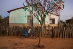 A boy walks a bike in the Sertão, a semiarid region in Northeast Brazil, where its people and land are shaped by years of relentless drought and social exclusion. Bahia, Brazil. 2015.Details – Handsigned. Open Edition. Medium: Archival pigment print. Paper: Pro Luster. Image Size: 8 x 10-inches, unframed. $135