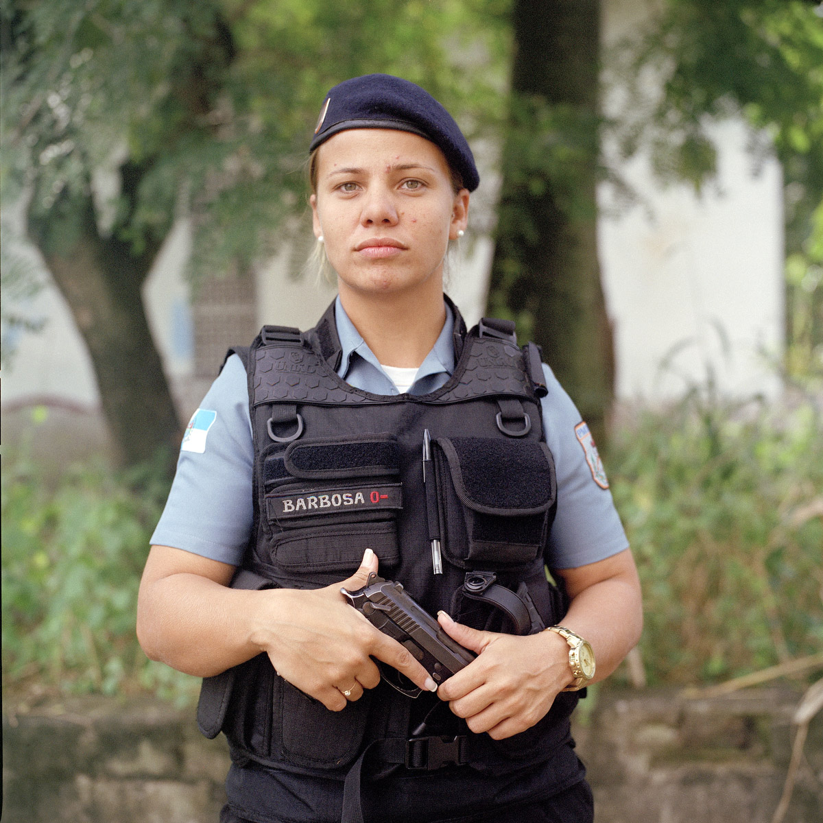Patrol officer Meriane Barbosa, 30 yrs old, is with the Rapid Response Team of the Pacifying Police Unit (UPP), in Complexo do Caju, Rio de Janeiro, Brazil. 