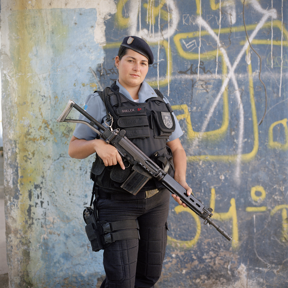 Svelen Araujo, 27, with the Rapid Response Team of the Pacifying Police Unit (UPP), in Complexo do Caju, Rio de Janeiro, Brazil.