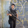 Svelen Araujo, 27, with the Rapid Response Team of the Pacifying Police Unit (UPP), in Complexo do Caju, Rio de Janeiro, Brazil.