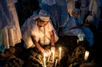 Worshippers honor Day of Yemenja, or Dia de Yemenja, goddess of the sea, is celebrated by thousands of Brazilians, in Salvador, Bahia, on Tuesday, Feb. 2, 2016. Devotees offer gifts such as flowers, objects of female vanity, Yemenja statues, and sweets to the goddess. Yemenja is an orisha, a saint that represents the natural world. She is viewed as the essence of motherhood, the protector of children, fishermen and sailors, and most importantly, she is the sea itself. She wears a dress with seven skirts that represent the seven seas. Originally Yemanja was a river goddess of the Yoruba in Nigeria. When Africans were kidnapped by western colonizers as enslaved people for the New World, Yemaya traveled with them, thus becoming the Goddess of the Ocean. Details – Edition: Limited to 50 prints. Medium: Archival pigment print. Paper: 100% Cotton Rag. Image Size: 10 x 6.67 inches, unframed.