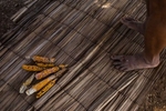 Passagem, Brazil. Wednesday, Nov. 11, 2015.“It has been three years of planting on this land. The river never returned, so I never left,{quote} said farmer Joselita Antunes dos Reis, 53, who saved the last of the corn to replant along the canals of the São Francisco River and Sobradinho Reservoir, in the state of Bahia, Brazil, on Wednesday, Nov. 11, 2015. She began fishing when she met her husband, a fisherman, but when he died last year of cancer, she returned to farming. She was a migrant who lived in São Paolo, while her six children stayed with her parents in the Sertão. She was domestically abused by a relative while living in São Paulo and eventually returned home. Since her husband's passing, she now plants on the islands that have emerged from the drought.