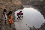 Campo Alegre de Lourdes, Brazil. Saturday, Nov. 14, 2015.A farming family collects water from a nearby water pond that will be used for cooking and washing. The pond has a milky color because of the minerals in the soil. Usually, subsistence farmers do not use the same pond water as the animals do but the drought— the worst in 50 years — has caused drastic water shortages and food insecurity. Historically the region has the single largest concentration of rural poverty in Latin America, with nearly 35% percent of families living in extreme poverty, according to the International Fund for Agricultural Development.