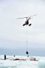 A helicopter is used to sling pelts