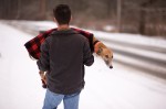 When Ella tired from her first walk, her foster dad carried her home, as though she were his own. © mark menditto(GR-0253)