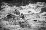 River guide Thomas Batey encountering turbulent water in  Chitham Rapid at 76,000 cfs in spring 2010.