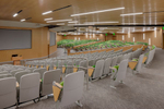 Interior view of college lecture hall with green seating which can be partitioned.Architectural Photography by: Paul Richer / RICHER IMAGES