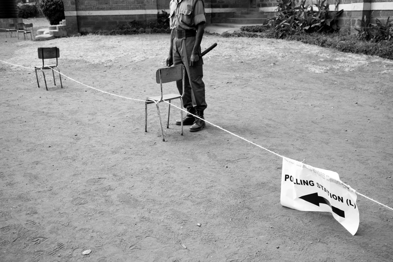 Voters in Kibera started to line up to cast their vote as early as 5am. Many voters were frustrated by the long lines and slow pace, but remained patient. The Kenyan police and army were present to keep people from cutting in line and make sure voters remained calm on March 4th, 2013 in the slum of Kibera in Nairobi, Kenya.