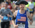 4/18/16-- FRAMINGHAM-- David Chatwin looked a lot like Paul Revere  running through downtown Framingham Marathon Monday.Daily News and Wicked Local Staff Photo/Art Illman