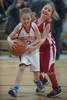 1/25/19-- HOLLISTON--   Holliston fourth graders Emma Kampersal, left, and Grace Schoenberg battle for the ball during halftime at a varsity girls game Friday night at Holliston High School.   [Daily News and Wicked Local Staff Photo/Art Illman]