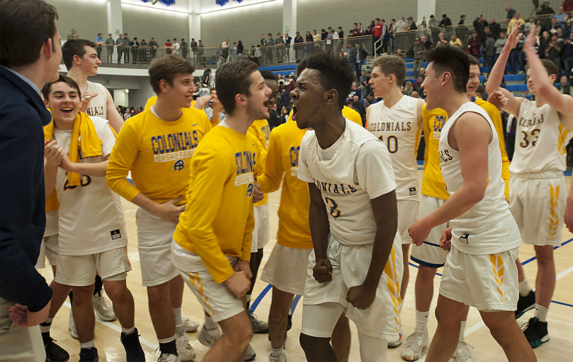 3/8/19-- WORCESTER--  Acton-Boxborough boys Central Mass. Div. 1 champions celebrate at a packed Worcester State University Friday night after defeating Algonquin 52-41.  [Daily News and Wicked Local Staff Photo/Art Illman]