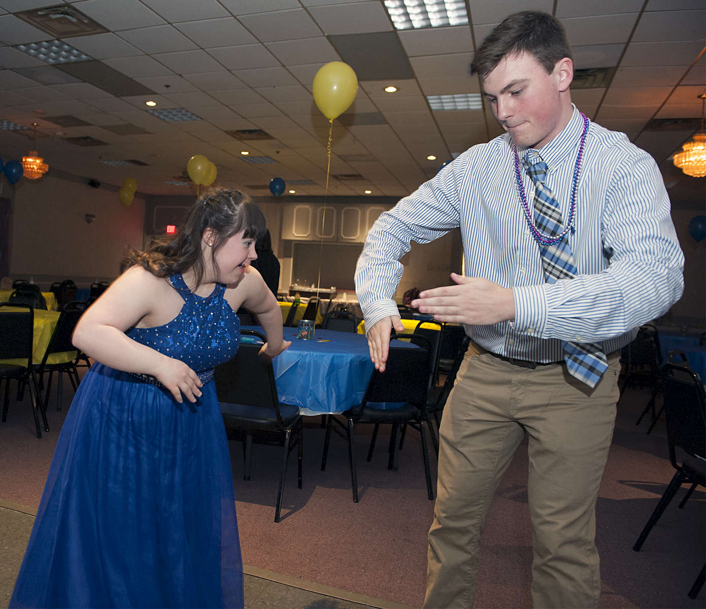 3/15/19-- FRANKLIN--  Sarah Kerr and Sean Hofferty do the robot during the annual Best Buddies Prom for Franklin High School students at the Franklin Elks Lodge 2136 Friday evening.  [Daily News and Wicked Local Staff Photo/Art Illman]
