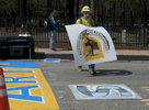 4/11/19-- HOPKINTON-- Will Belazoos of Road Safe Traffic Systems with Connor Freitas, not pictured, painted the starting line Thursday for the 123rd running of the Boston Marathon on Monday, April 15.   [Daily News and Wicked Local Staff Photo/Art Illman]