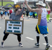 4/15/19-- FRAMINGHAM-- Ashley Ginther of Reading, PA was in Framingham shouting {quote}You're awesome{quote} to passing Boston Marathon runners. [Daily News and Wicked Local Staff Photo/Art Illman]