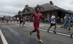4/15/19-- FRAMINGHAM--  Boston Marathon runners stride through Framingham Monday. [Daily News and Wicked Local Staff Photo/Art Illman]