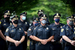 7/21/20-- FRAMINGHAM-- Dozens of police chiefs attended a rally addressing proposed state police reform bills.  The rally was held at an otherwise empty AMC Movie theatre parking lot Tuesday morning. [Daily News and Wicked Local Staff Photo/Art Illman]