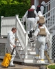 A hazmat team enters a building at the Sheffield Court Condominiums at 624 Boston Post Road in Marlborough, Sept. 8, 2022. Tuesday emergency personnel responded to a medical emergency and found {quote}a large amount  of unidentied unlabeled  chemicals.{quote} Ten families were displaced. FBI and State Police were at the scene late on Wednesday. 