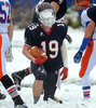 11/27/14 SUDBURY--- Lincoln Sudbury Regional High School running back #19 captain Eric Jones comes up with a facemask full of snow during the Thanksgiving game against Newton South Thursday morning.Daily News Staff Photo/Art Illman
