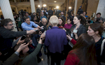 1/2/19-- BOSTON--  Senator Elizabeth Warren surrounded by the Boston media after legislators were sworn in at the Senate chambers Wednesday. She announced an exploratory committee to run for President. [Daily News and Wicked Local Staff Photo/Art Illman]