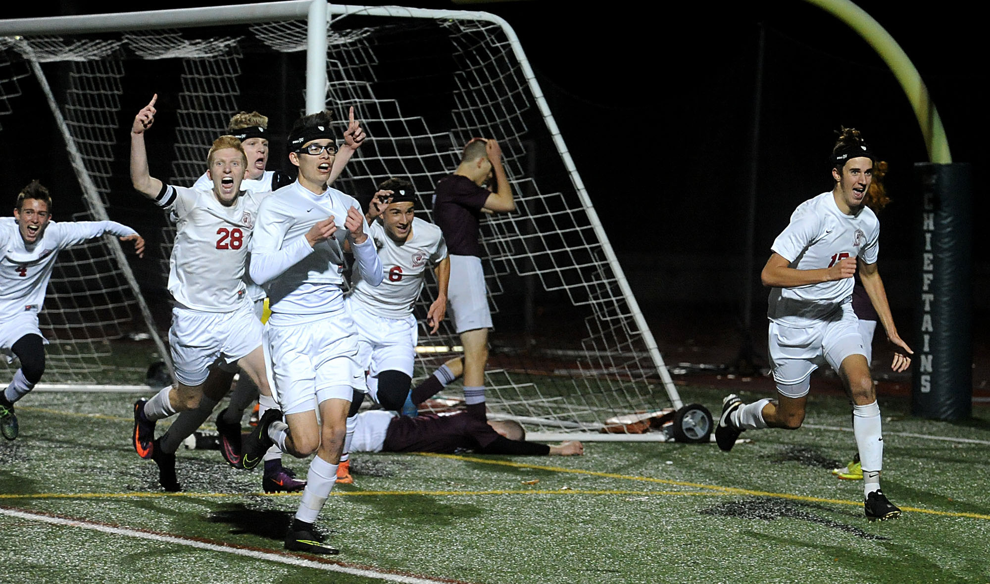 11/16/16-- BOLTON--  Westborough's Tyler Stott, right, after making the game winning header in overtime against Amherst Wednesday night at Nashoba Regional High  School. Also celebrating from left: Michael Reh; Spencer Nagi; Chris Amador; Dan Bugaev.Daily News and Wicked Local Staff Photo/Art Illman