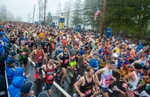 Runners in the first wave in the 127th running of the Boston Marathon in Hopkinton, April 17, 2023.