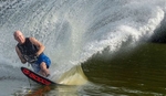 Mike Tilton, of Natick, practices competetive water skiing on the South lake portion of Lake Cochituate, July 9, 2024.