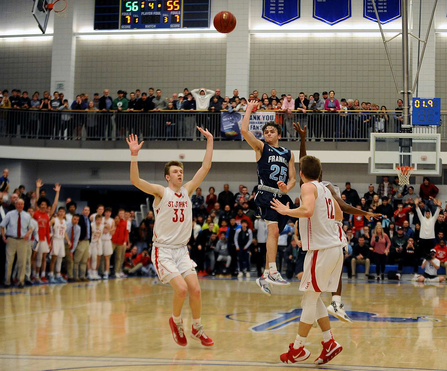 3/6/20  Franklin High School senior guard  Brayden Sullivan with a last second shot in the Division 1 Central Division Finals at Worcester State University Friday night.  St John's won, 56-55. This was also symbolically a “last shot” before the COVID-19 pandemic put an end to spring sports.  [Daily News and Wicked Local Staff Photo/Art Illman]