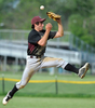 Weston shortstop Steve Tocci goes airborne tring to snag a line drive in action Monday afternoon at Concord Carlisle.