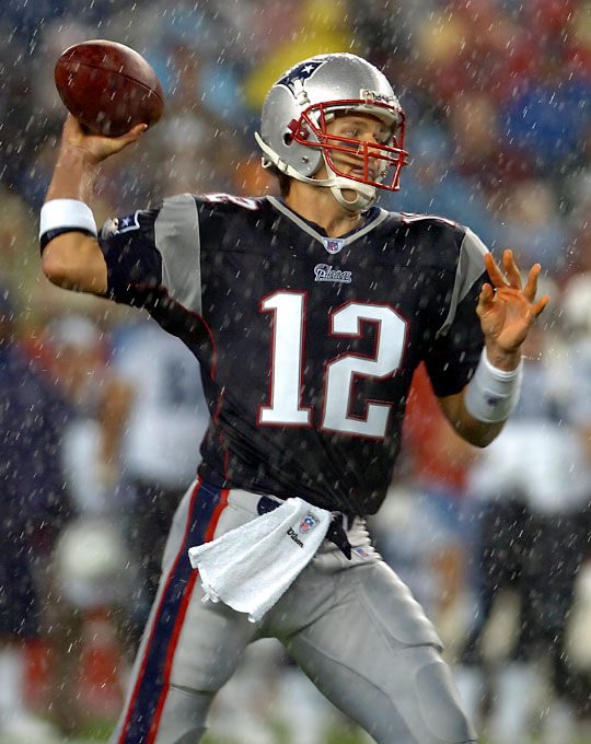 Patriots quarterback Tom Brady during a rain filled pre-season game against the Tennessee Titans August 17, 2007.
