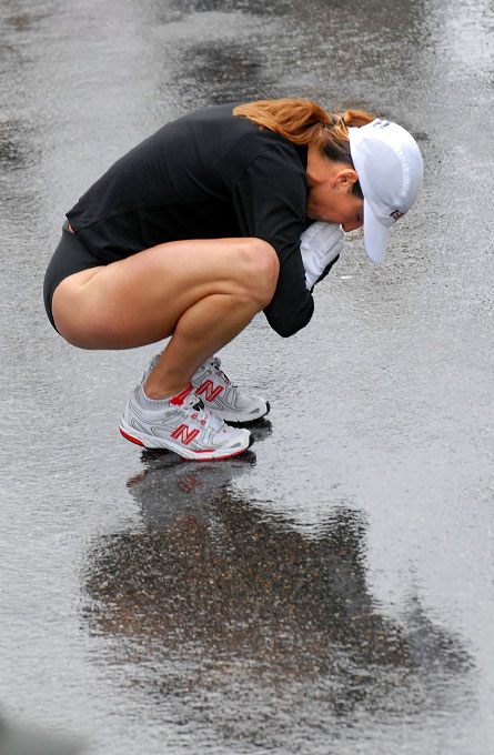 In 2007, elite runner Kelly Flathers of California focuses herself at  the  starting line.