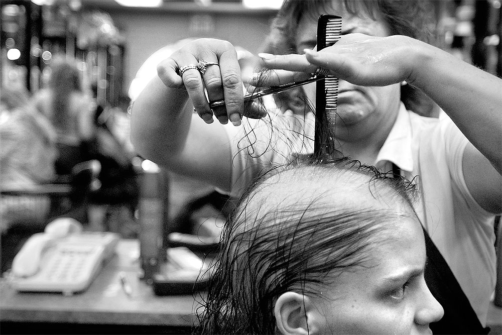 After being released from the hospital on June 6, Mooda gets a haircut from Diana Herrera at Changes Unlimited. Although chemotherapy has caused most of her once full head of hair to fall out, Mooda does not want to lose the remaining strands.