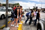 Following school at Albuquerque's Del Norte High School, students stand in the median waiting for a break in traffic so they can cross to the safety of the sidewalk. The intersection San Mateo and Montgomery Boulevard is one of the busiest and most deadly the city.