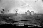 Dirt and frost obscure the view through the windshield of Bill Maronic's 1977 Toyota truck, {quote}Old Faithful.{quote} Maronic is on his way to buy wood shavings for his farm in Smiths Grove, Ky.