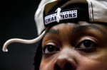 Maryland's Charmaine Carr keeps a souvenir piece of the net in a hat she received following her team's victory over Utah in the 2006 NCAA regional final in Albuquerque at the Pit.