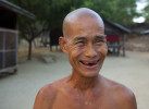 © MARK 'CRUSTY' BAKER - 12.11.2012 -  A monk smiles after having his head shaved by colleagues in Bagan, Myanmar.