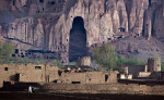 © GRAHAM CROUCH - 08.05.2012, The empty caves that once contained the largest free standing statues of Buddha still dominate the skyline of Bamiyan Afghanistan The statues were blown up by the Taliban in March 2001 