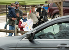 TRURO - Cameron Miner, 9, receives birthday greetings in the form of a “Birthday Caravan” organized by Truro’s Recreation Department on Wednesday, April 15, 2020. His parents, Chris and Nicole and brother, Gus, 4, wave to the well-wishers behind him.