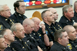 Police officers attend the funeral service for Auburn Police Officer Ronald Tarentino, Jr., 42, of Leicester, Mass. in St. Joseph's Church in Charlton on Friday, May 27, 2016. Officer Tarentino died after being shot during a traffic stop Sunday. 