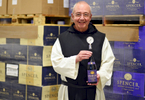 Father Isaac Keeley with the soon-to-released Monk's Reserve Ale, a Trappist Quadrupel, in the warm room at the Spencer Brewery. © Christine Hochkeppel