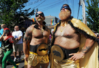 PROVINCETOWN -- 082114 -- Tony Ferringo and Ron Canal as Golden Stache and Golden Bear at the 36th Annual Carnival parade with the theme Comic Book Capers.  