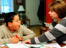 WEST YARMOUTH -- 03/31/11 -- Nickolas Qvarnstrom, 10, yells at his mother, Tina, when he becomes frustrated while correcting his subtraction homework. Math is one of Nickolas's least favorite subjects. He is currently learning at a second grade level. 