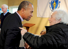 Gov. Deval Patrick shakes hands with Thelma Goldstein of Falmouth at the Sandwich Democratic Town Committee's coordinated campaign office. © Christine Hochkeppel