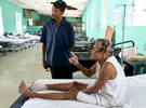 Noemie Altenice, 70, at the Les Cayes hospital recovering from a foot amputation on Thursday, November 3, 2016. She was suffering because the nurses did not have any pain medication to give her.