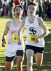 St. John's Prep junior Tristan Shelgren edges out Brookline sophomore Lucas Aramburu for second place as they approach the finish line of the Division 1 state cross-country championship at Gardner Municipal Golf Course on Saturday, November 19, 2016. T&G Staff/Christine Hochkeppel