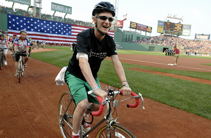 Matt Starring, 22, rode his bike around the warning track at Fenway Park with other Pan Mass Challenge riders and volunteers on Saturday, July 12, 2008. Starring registered as a rider in this charity bike ride for two years in a row, but because of his relapses he was not able to ride with his father as planned either year.